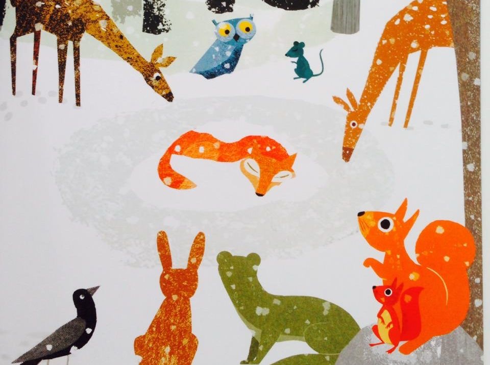 group of animals in the snow