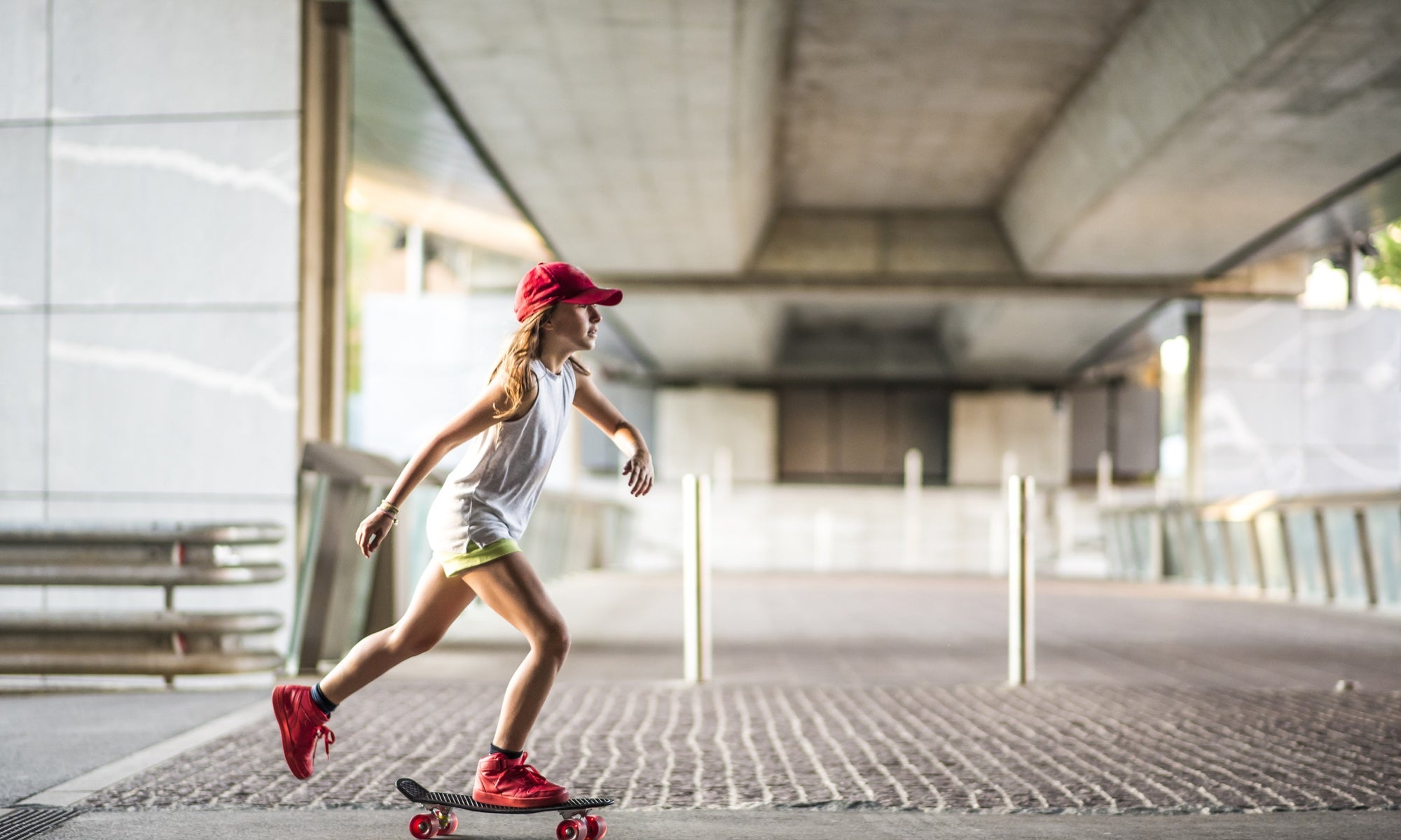 girl skating on a road