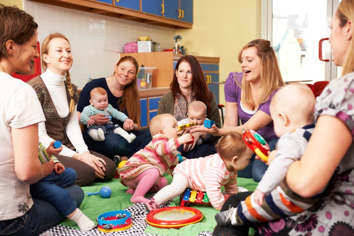 Mothers and their children in a Kitty party