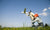 A child and his father palying with an aeroplane 