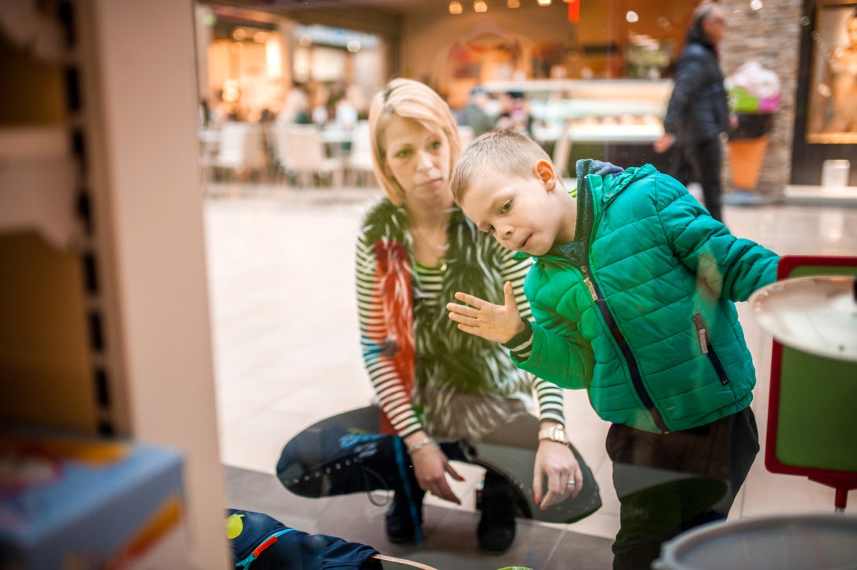 mom and son window shopping 