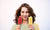 girl eating two ice cream sticks