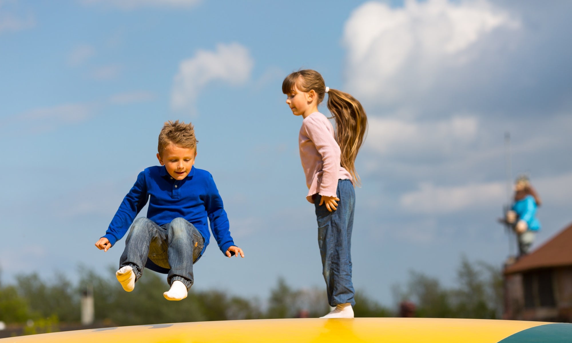 Kids bouncing in playground