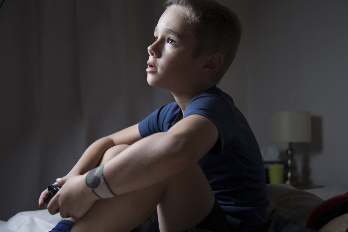 Little boy playing video game