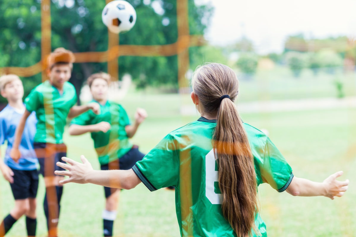 kids playing football