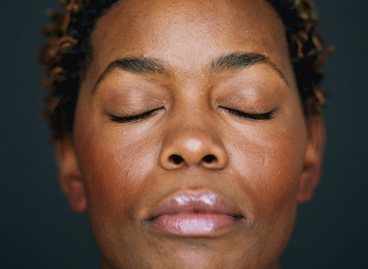 black females face with eyes closed