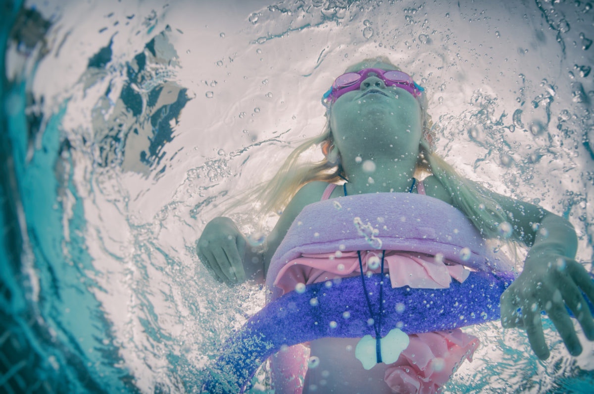 A child swimming in under water