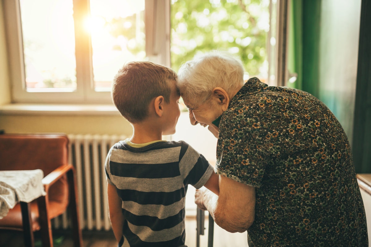 Grandparent loving to a kid