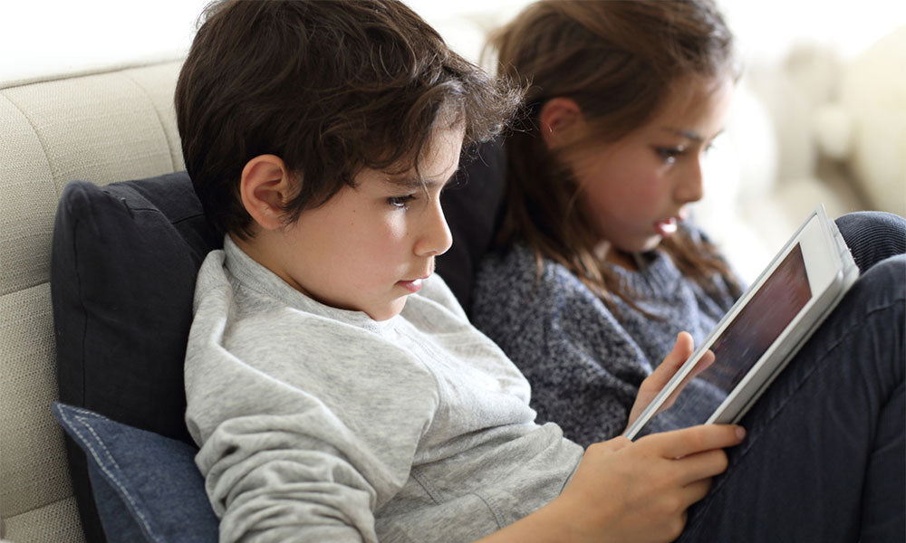 kids playing with touchpad