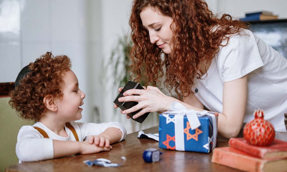 mom giving son presents