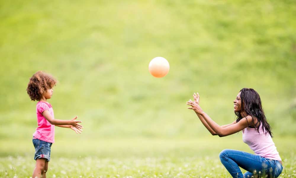 mother daughter playing