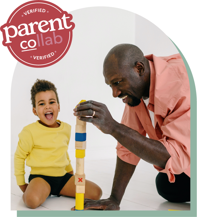 father and son using building blocks